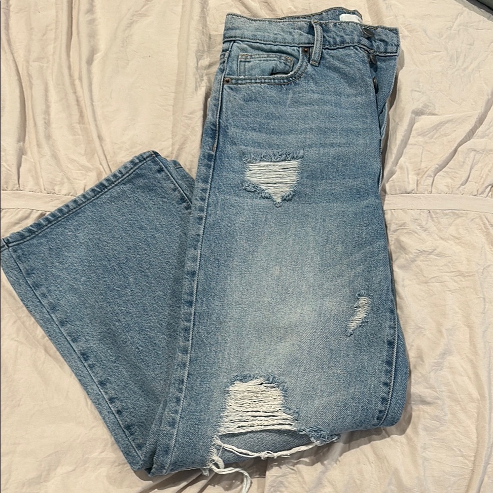 Distressed Blue Denim Jeans